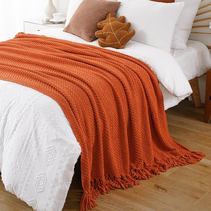 BATTILO HOME Burnt Orange Throw Blanket for Couch, Knit Fall Decor Blanket Versatile for Chair, Decorative Halloween Blanket with Tassels for Bed, 60" x 80"